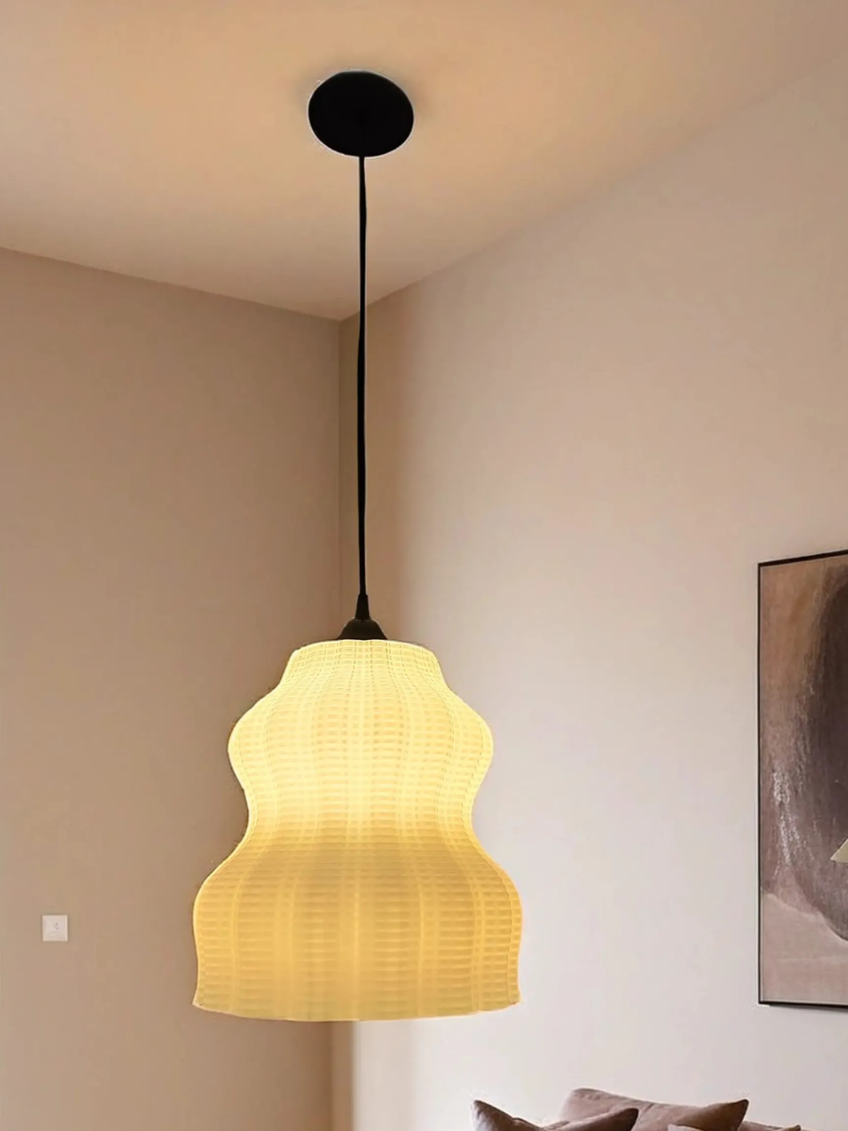 Nautica designer pendant light, in a living room
