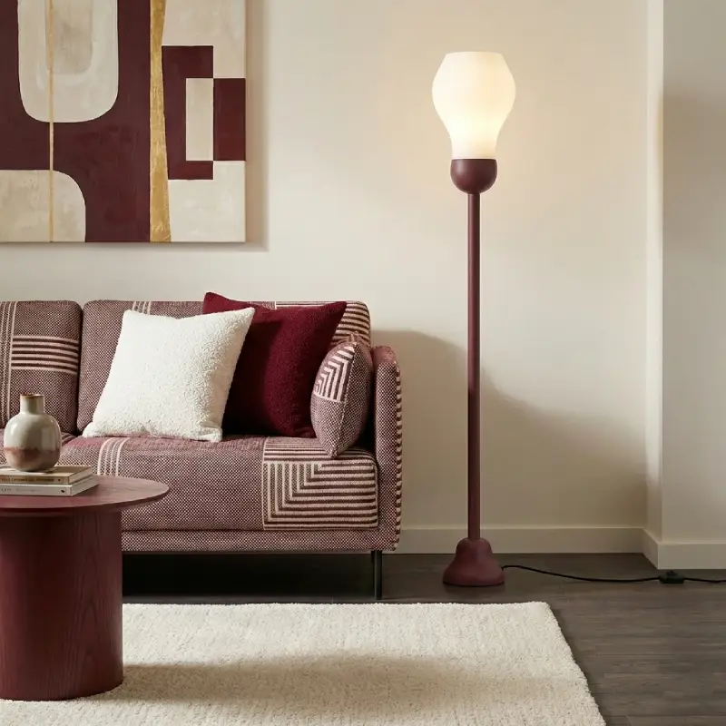 SunFlare Floor Lamp, carmine base, in a contemporary living room